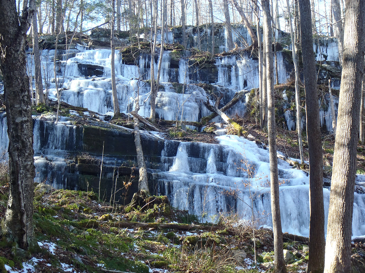 Water rushes down a waterfall at the Stairway Wild Area in Delaware State Forest.