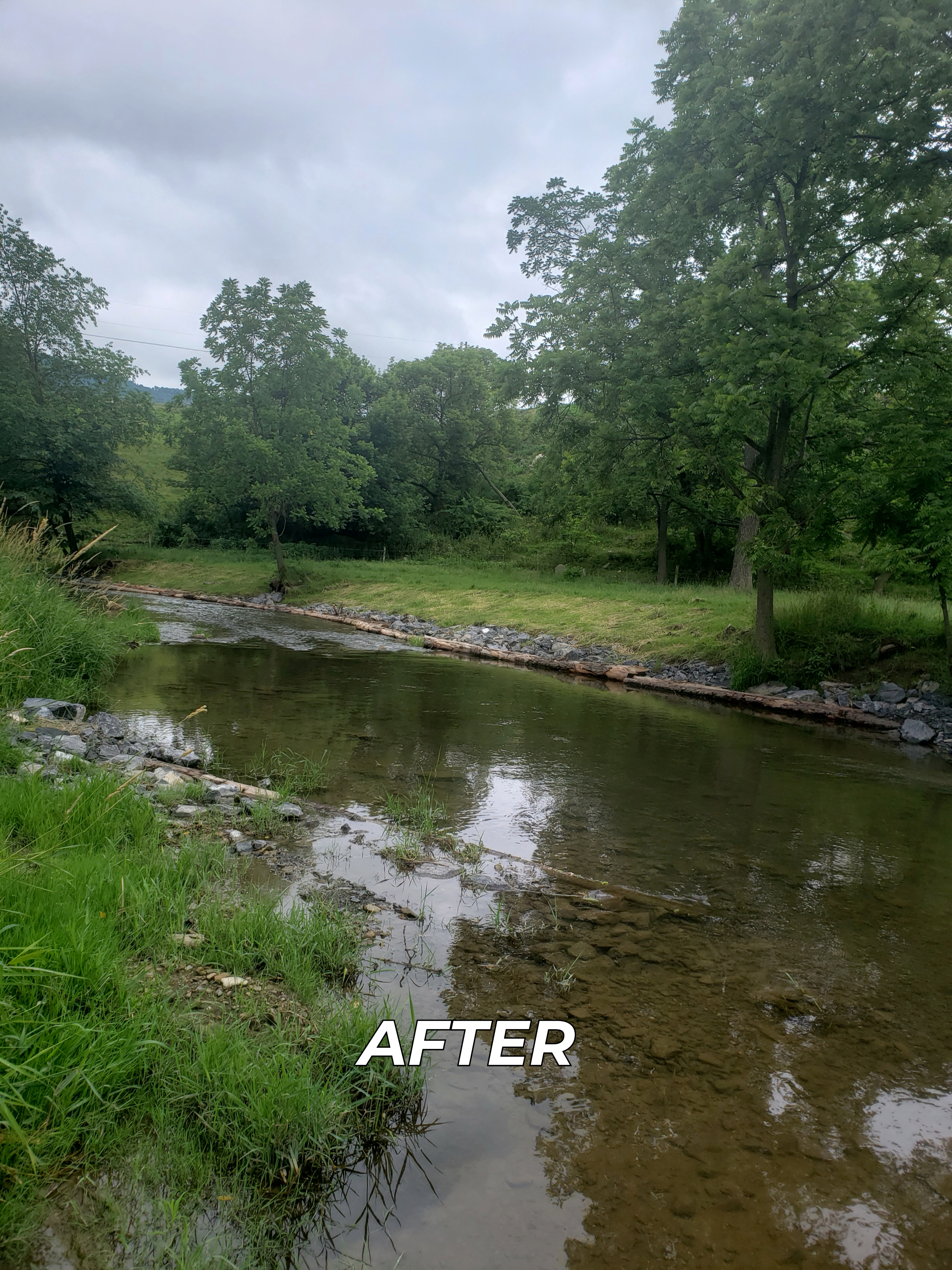 A picture of Kishaquillas Creek in Mifflin County after stream habitat improvement to build back the stream bank.