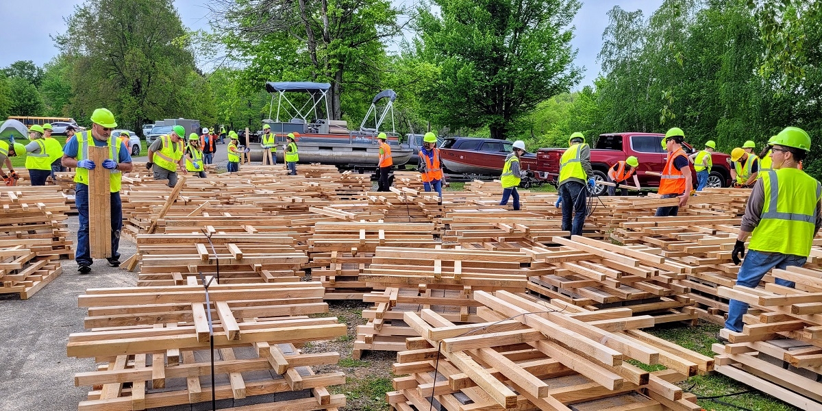 Staff and volunteers building porcupine boxes at Pymatuning 