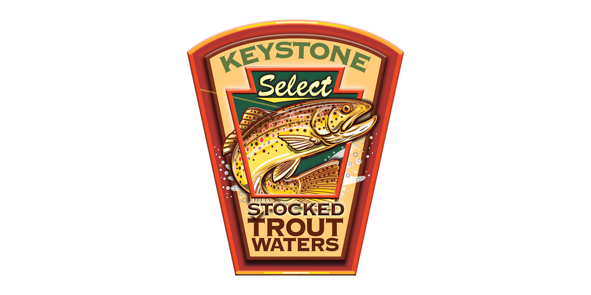 Keystone with a brown trout showcasing the Keystone Stocked Trout Waters logo