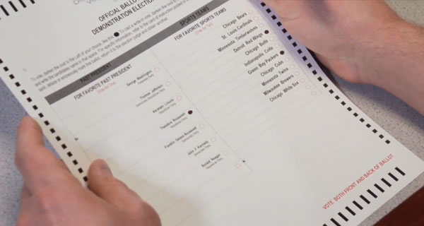 A voter reviewing the ballot