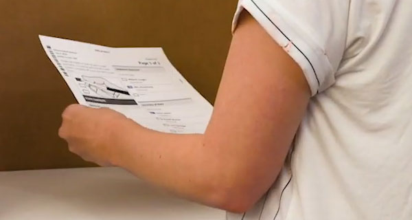 Person standing in a voting booth